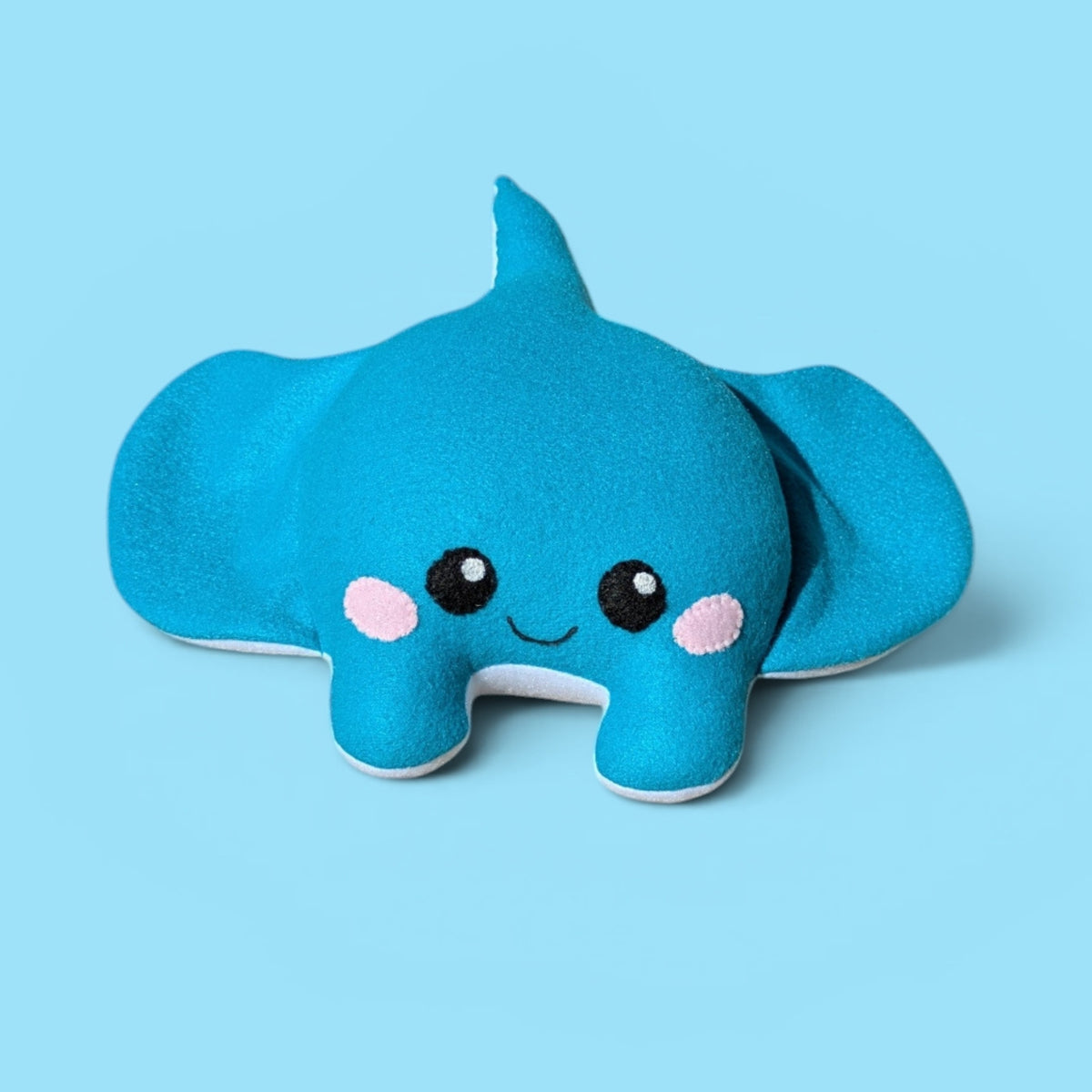 Handmade Blue Fleece Stuffed Animal Stingray with felt eyes and cheeks and a gentle smile