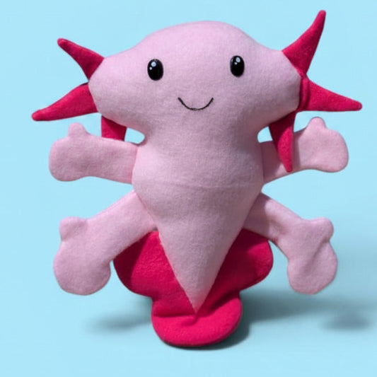 A plush fleece axolotl stuffed animal with light pink body and arms and hot pink gills and fins
